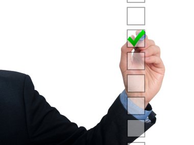 Businessman ticks off in in a square. Task list concept. Isolated on grey background.