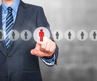 Businessman pressing button on virtual screens. Business, technology, internet, networking and recruitment concept - Stock Image
