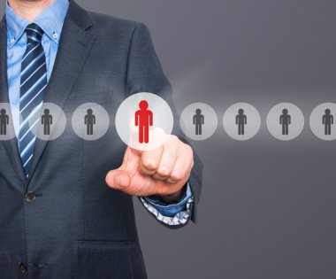 Businessman pressing button on virtual screens. Business, technology, internet, networking and recruitment concept - Stock Image
