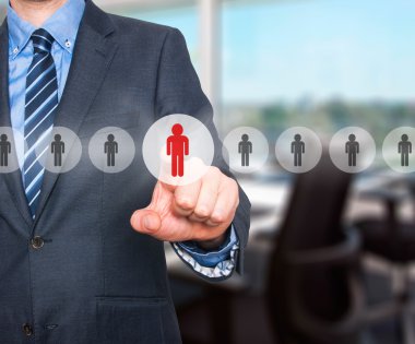 Businessman pressing button on virtual screens. Business, technology, internet, networking and recruitment concept - Stock Image