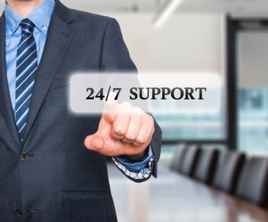 Businessman pointing at all day support  services. Internet online support business concept. Stock Image