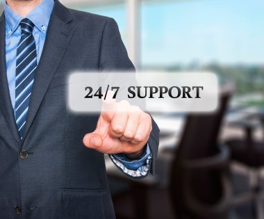 Businessman pointing at all day support  services. Internet online support business concept. Stock Image