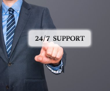 Businessman pointing at all day support  services. Internet online support business concept. Stock Image