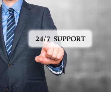 Businessman pointing at all day support  services. Internet online support business concept. Stock Image