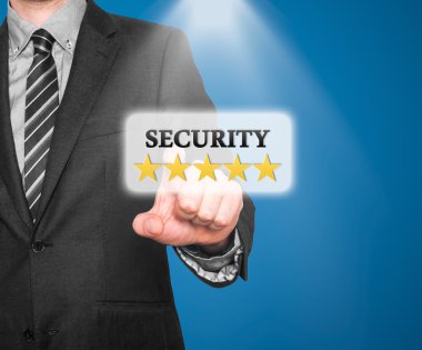 Internet security online business concept businessman pointing five stars security services. Isolated on office background. Stock Image