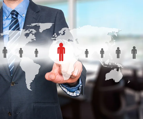 Businessman touching human resources sign - HR, HRM, HRD concept. World Map. Stock Image — Stok fotoğraf