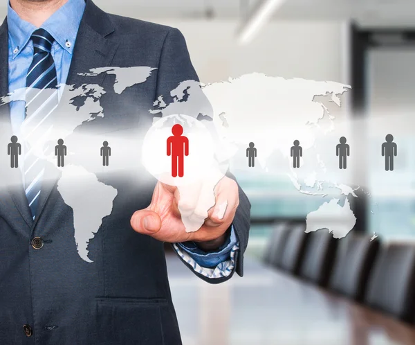 Businessman touching human resources sign - HR, HRM, HRD concept. World Map. Stock Image — Stock fotografie