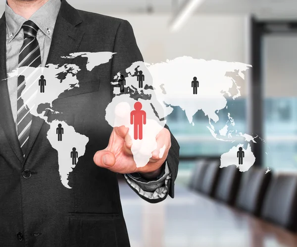 Businessman touching human resources sign - HR, HRM, HRD concept. World Map. Stock Image — Stockfoto