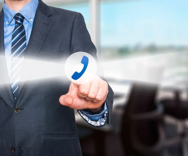 Businessman pressing phone button on visual screen. Customer support concept.  Stock Image — Stock Photo, Image