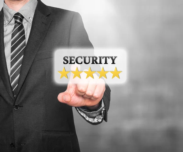 Internet security online business concept businessman pointing five stars security services. Isolated on office background. Stock Image — Stock fotografie