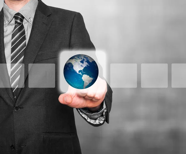 Un hombre de negocios tocando un globo en la pantalla. Concepto de negocio. Imagen de stock —  Fotos de Stock