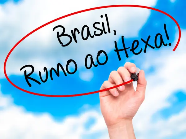 Man Hand writing Brasil, Rumo ao Hexa! with black marker on visu — Stock Photo, Image