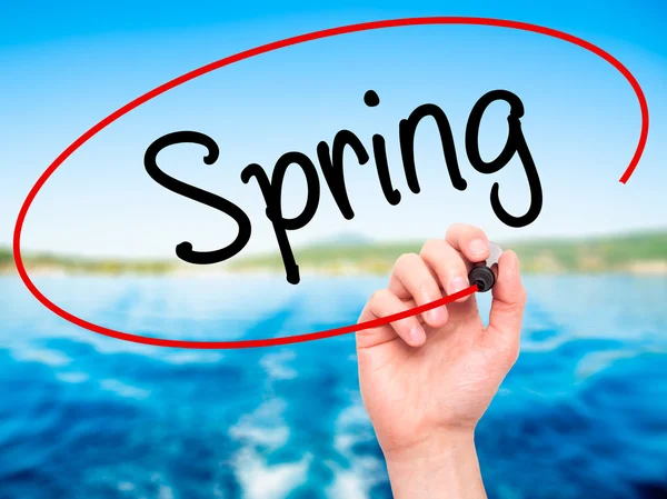 Man Hand writing Spring with black marker on visual screen. — Stock Photo, Image