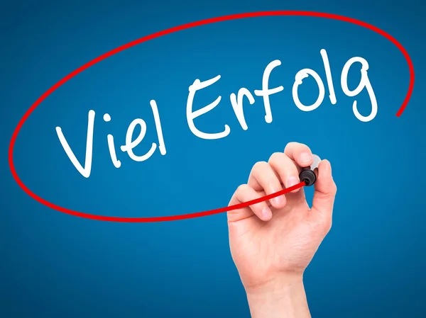 Man Hand writing Viel Erfolg (Much Success In German) with black — Stock fotografie