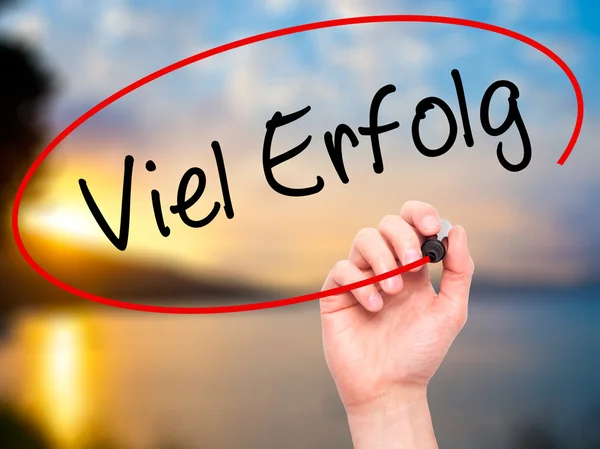 Man Hand writing Viel Erfolg (Much Success In German) with black — Stock fotografie