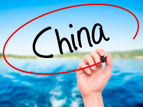 Man Hand writing China with black marker on visual screen — Stock Photo, Image