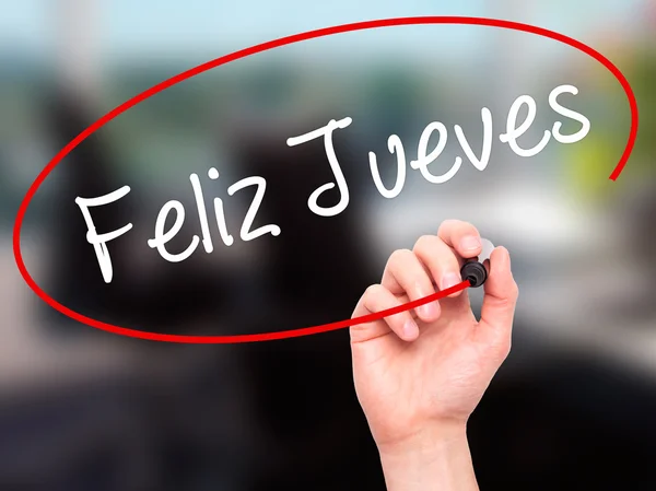 Man Hand schrijven Feliz Jueves (gelukkig donderdag In het Spaans) met b — Stockfoto