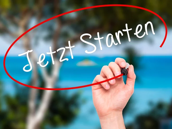 Man Hand writing Jetzt Starten (Start Now in German) with black — Stock Photo, Image