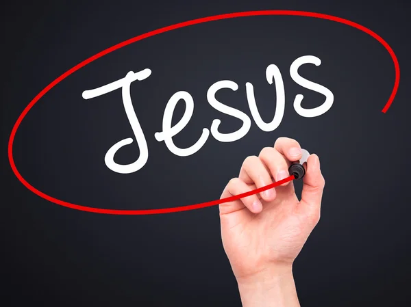 Man Hand writing Jesus  with black marker on visual screen — Stock Photo, Image