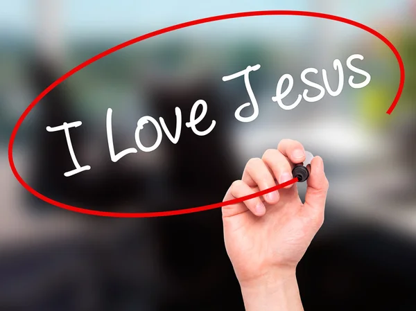 Man Hand skriver jag kärlek Jesus med svart markering på visuella skärm — Stockfoto