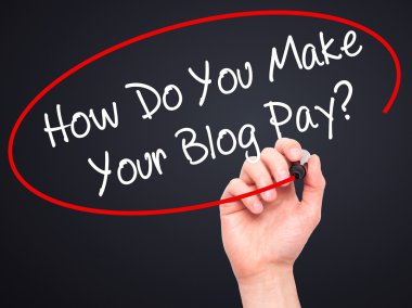 Man Hand writing How Do You Make Your Blog Pay? with black marke