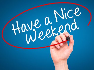 Man Hand writing Have a Nice Weekend  with black marker on visua
