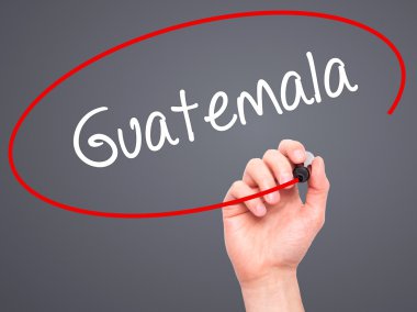 Adam el Guatemala siyah kalemi ile görsel ekranda yazma.
