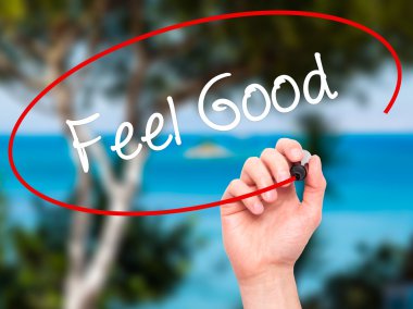 Adam el Feel Good siyah kalemi ile görsel ekranda yazma