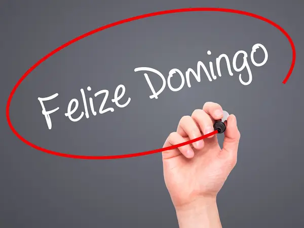 Ruka muže psaní Lenka Domingo (Happy Sunday ve španělštině/Portugu — Stock fotografie