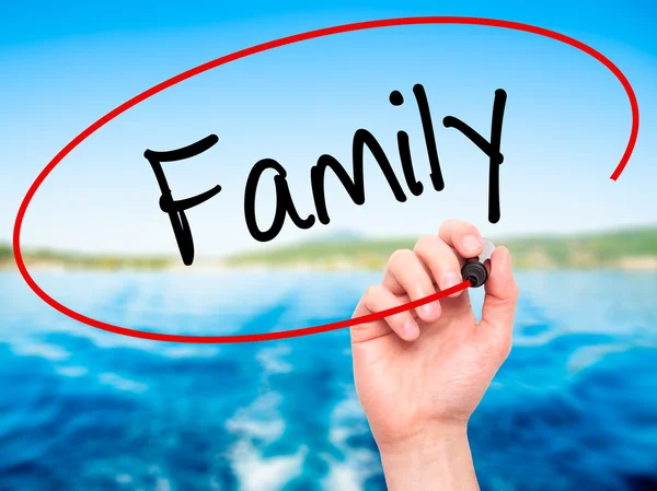 Man Hand writing Family with black marker on visual screen — Stock Photo, Image