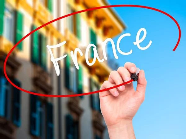 Man Hand writing France with black marker on visual screen — Stock Photo, Image