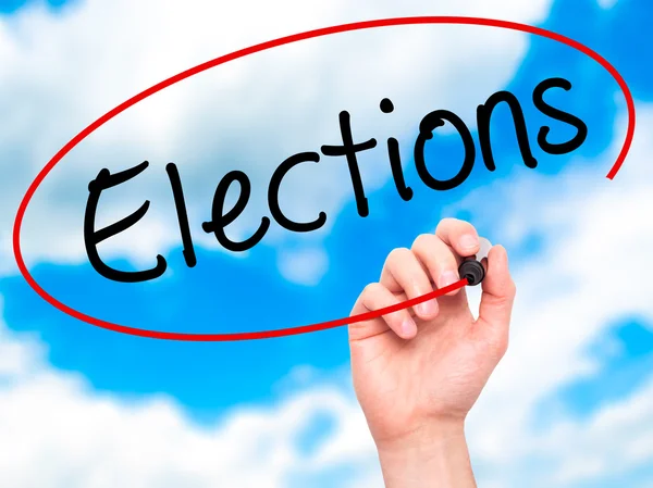 Man Hand writing Elections with black marker on visual screen — Stock Photo, Image