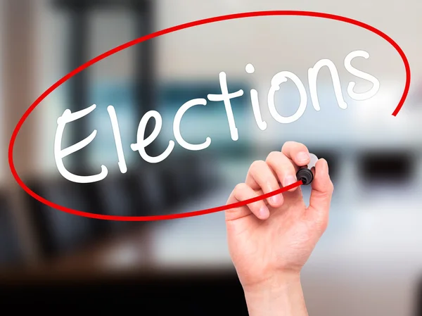 Man Hand writing Elections with black marker on visual screen — Stock Photo, Image