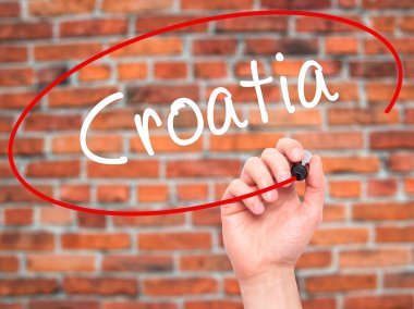 Adam el Hırvatistan ile siyah kalemi görsel ekranda yazma.