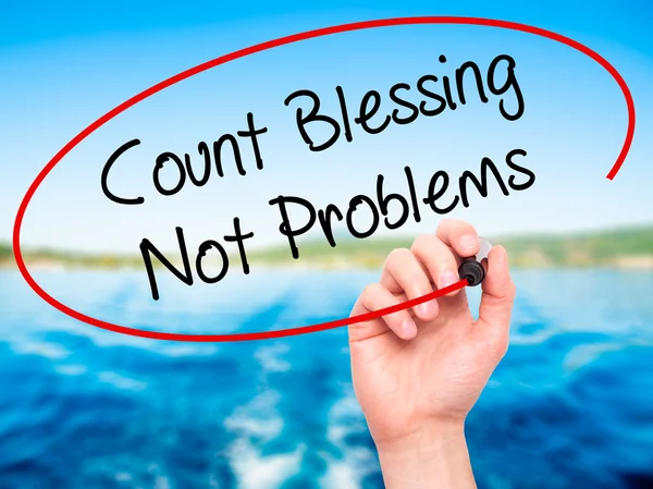 Man Hand writing Count Blessing Not Problems with black marker o — Stock Photo, Image