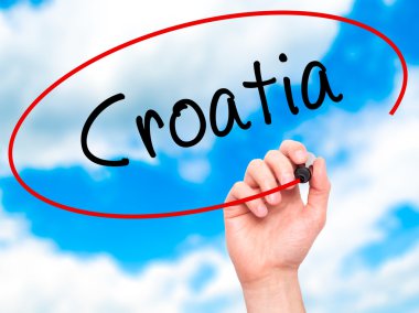 Adam el Hırvatistan ile siyah kalemi görsel ekranda yazma.