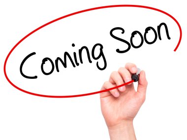 Adam el Coming Soon görsel ekranda siyah kalemi ile yazma