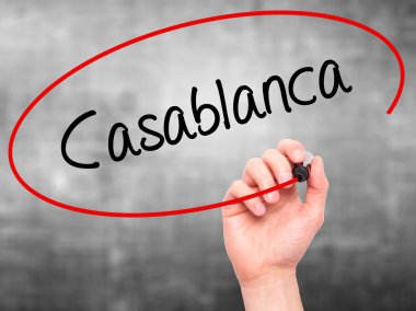 Adam el Casablanca siyah kalemi ile görsel ekranda yazma.