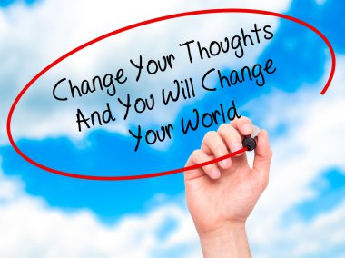 Man Hand writing Change Your Thoughts And You Will Change Your W