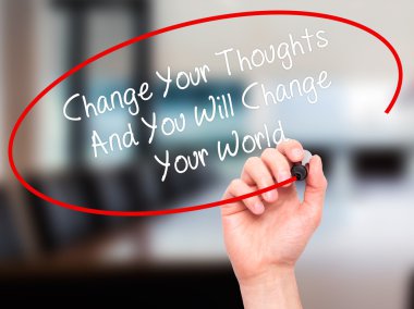 Man Hand writing Change Your Thoughts And You Will Change Your W