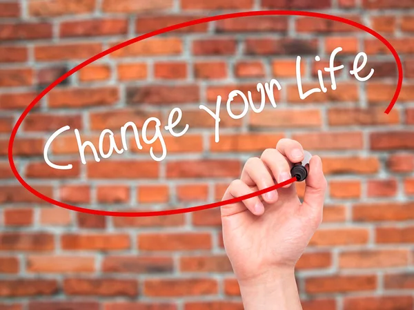 Man Hand writing Change your Life with black marker on visual sc — Stock Photo, Image