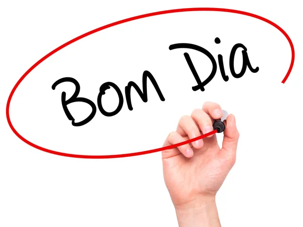 Man Hand skriva "Bom Dia" (i portugis - bra morgone — Stockfoto