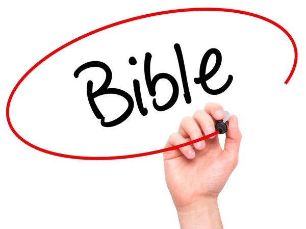 Man Hand writing Bible with black marker on visual screen — Stock Photo, Image