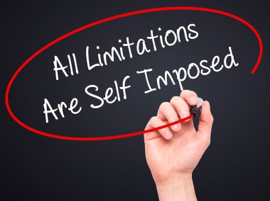 Man Hand writing All Limitations Are Self Imposed with black mar clipart