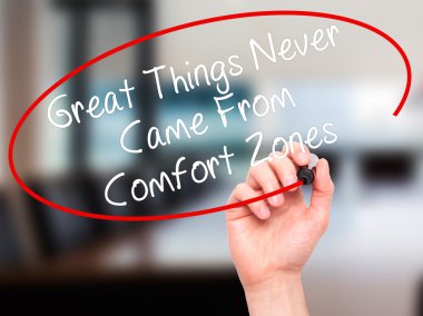 Man Hand writing Great Things Never Came From Comfort Zones with clipart