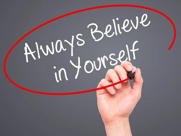 Man Hand writing Always Believe in Yourself with black marker on — Stock Photo, Image