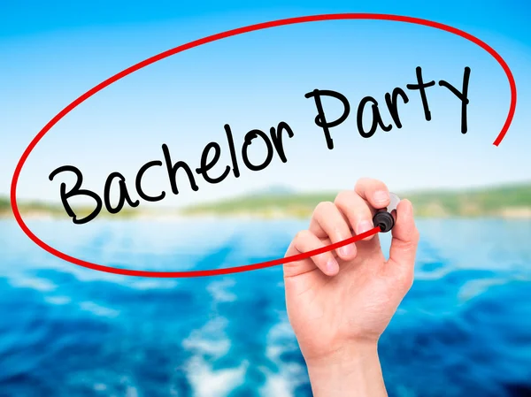 stock image Man Hand writing Bachelor Party with black marker on visual scre