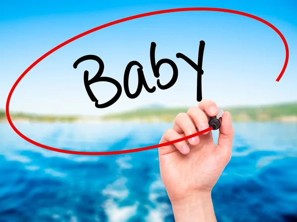Man Hand writing Baby with black marker on visual screen — Stock Photo, Image