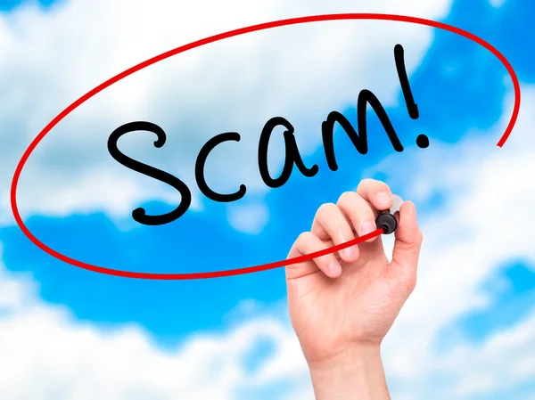 Man Hand writing  Scam! with black marker on visual screen — Stock Photo, Image