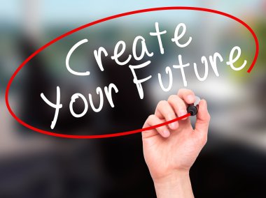 Adam el Your geleceği oluşturmak ile siyah kalemi görsel üzerinde yazılı. 